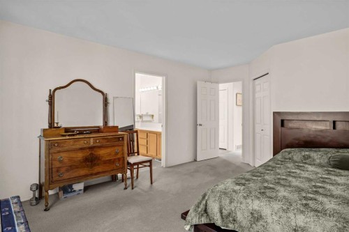 147 Benchlands Terrace South, Canmore, AB - Indoor Photo Showing Bedroom