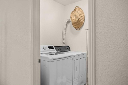 147 Benchlands Terrace South, Canmore, AB - Indoor Photo Showing Laundry Room