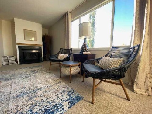 338-457 Collinge Road, Hinton, AB - Indoor Photo Showing Living Room With Fireplace