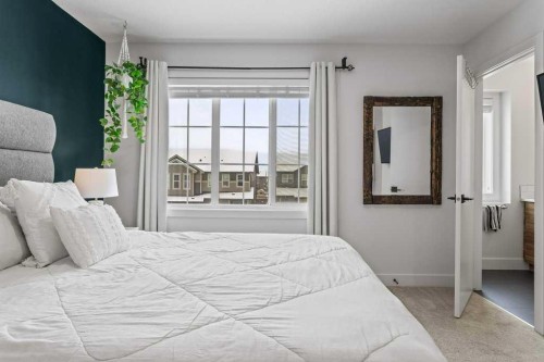216 Clydesdale Avenue, Cochrane, AB - Indoor Photo Showing Bedroom