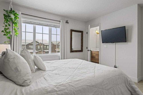 216 Clydesdale Avenue, Cochrane, AB - Indoor Photo Showing Bedroom