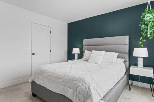 216 Clydesdale Avenue, Cochrane, AB - Indoor Photo Showing Bedroom