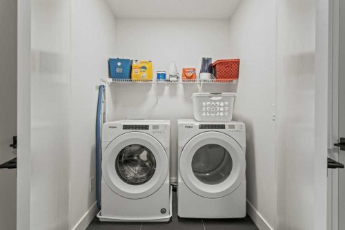 216 Clydesdale Avenue, Cochrane, AB - Indoor Photo Showing Laundry Room