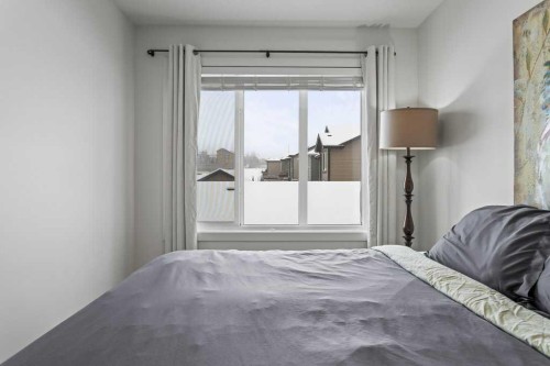 216 Clydesdale Avenue, Cochrane, AB - Indoor Photo Showing Bedroom