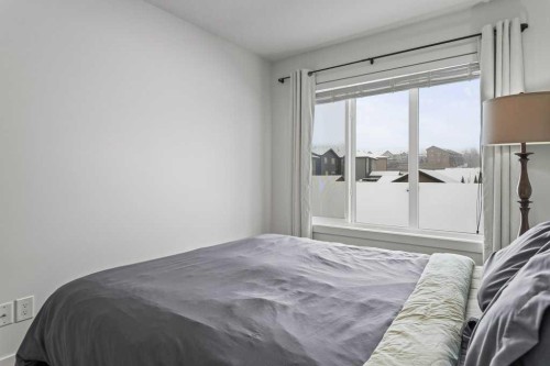 216 Clydesdale Avenue, Cochrane, AB - Indoor Photo Showing Bedroom