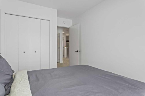 216 Clydesdale Avenue, Cochrane, AB - Indoor Photo Showing Bedroom