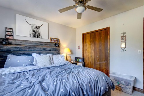303 Pioneer Road, Canmore, AB - Indoor Photo Showing Bedroom