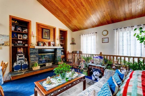 B-123 Grizzly Street, Banff, AB - Indoor With Fireplace