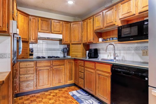 B-123 Grizzly Street, Banff, AB - Indoor Photo Showing Kitchen With Double Sink