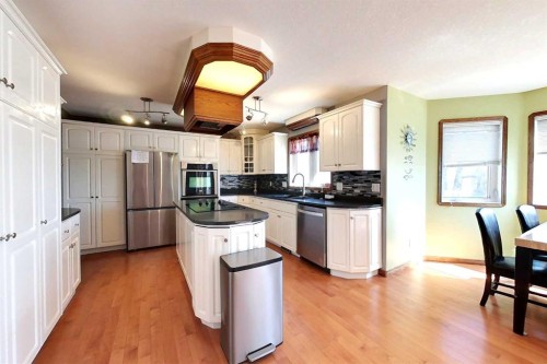 23 Springwood Drive Ne, Slave Lake, AB - Indoor Photo Showing Kitchen With Stainless Steel Kitchen