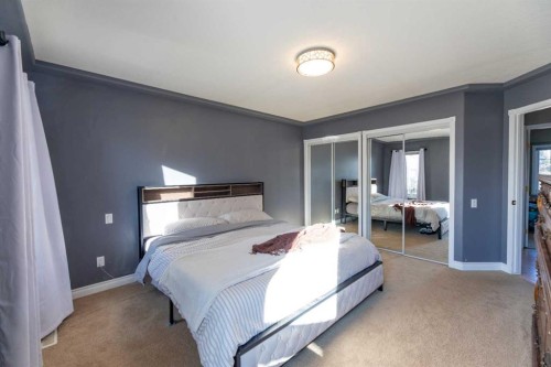 102 Marciszyn Place, Hinton, AB - Indoor Photo Showing Bedroom