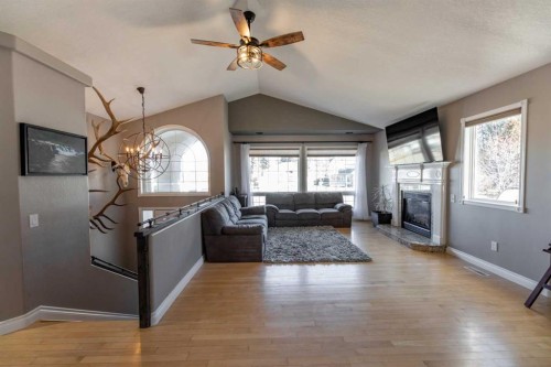 102 Marciszyn Place, Hinton, AB - Indoor Photo Showing Living Room With Fireplace