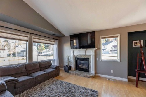 102 Marciszyn Place, Hinton, AB - Indoor Photo Showing Living Room With Fireplace