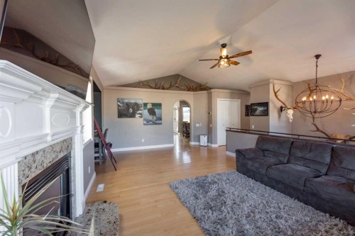 102 Marciszyn Place, Hinton, AB - Indoor Photo Showing Living Room With Fireplace