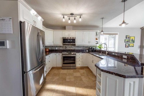 102 Marciszyn Place, Hinton, AB - Indoor Photo Showing Kitchen With Double Sink With Upgraded Kitchen