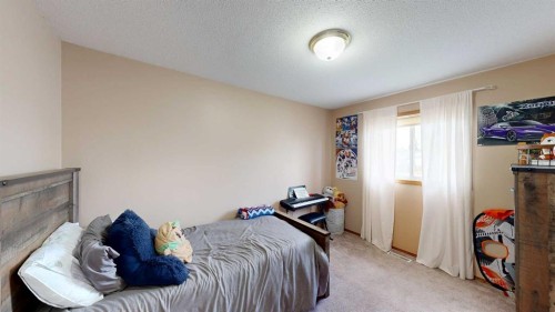8 Trading Post Trail, Whitecourt, AB - Indoor Photo Showing Bedroom