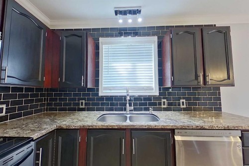 4914 59 Street, Athabasca, AB - Indoor Photo Showing Kitchen With Double Sink