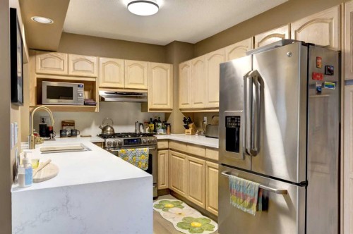 36 Antelope Lane, Banff, AB - Indoor Photo Showing Kitchen With Double Sink