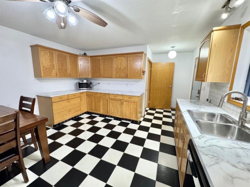 28 Steward Drive, Whitecourt, AB - Indoor Photo Showing Kitchen With Double Sink