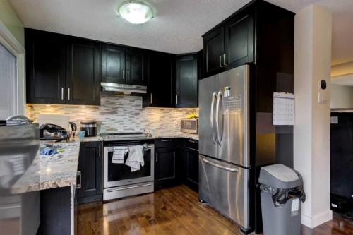 116 Nahanni Drive, Banff, AB - Indoor Photo Showing Kitchen With Upgraded Kitchen