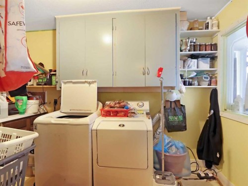 813 13Th Street, Canmore, AB - Indoor Photo Showing Laundry Room
