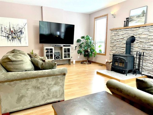 4228 8 Avenue, Edson, AB - Indoor Photo Showing Living Room With Fireplace