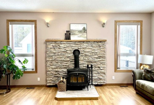 4228 8 Avenue, Edson, AB - Indoor Photo Showing Living Room With Fireplace
