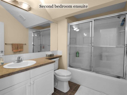 117-13 Aspen Glen, Canmore, AB - Indoor Photo Showing Living Room With Fireplace