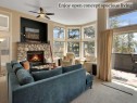 117-13 Aspen Glen, Canmore, AB  - Indoor Photo Showing Living Room With Fireplace 