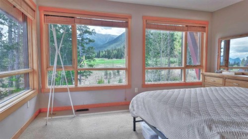 1-101 Armstrong Place, Canmore, AB - Indoor Photo Showing Bedroom