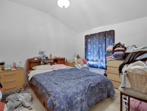 809 13 Street, Canmore, AB - Indoor Photo Showing Bedroom