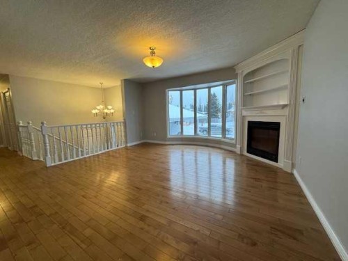 5226 18 Avenue, Edson, AB - Indoor Photo Showing Other Room With Fireplace