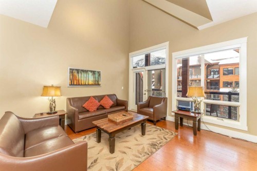407-187 Kananaskis Way, Canmore, AB - Indoor Photo Showing Living Room