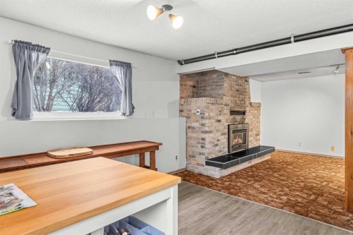 1001 9Th Avenue, Canmore, AB - Indoor With Fireplace