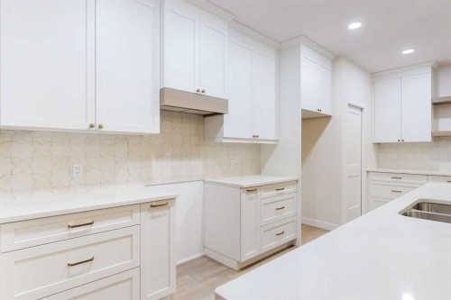 23 Riverdale Bend, Whitecourt, AB - Indoor Photo Showing Kitchen With Double Sink