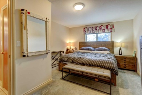 A-510 Wolf Street, Banff, AB - Indoor Photo Showing Bedroom