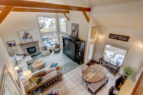 A-510 Wolf Street, Banff, AB - Indoor With Fireplace