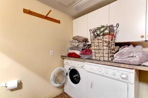A-510 Wolf Street, Banff, AB - Indoor Photo Showing Laundry Room