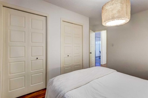 A-208 Muskrat Street, Banff, AB - Indoor Photo Showing Bedroom