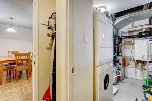 A-208 Muskrat Street, Banff, AB - Indoor Photo Showing Laundry Room