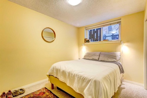 A-208 Muskrat Street, Banff, AB - Indoor Photo Showing Bedroom