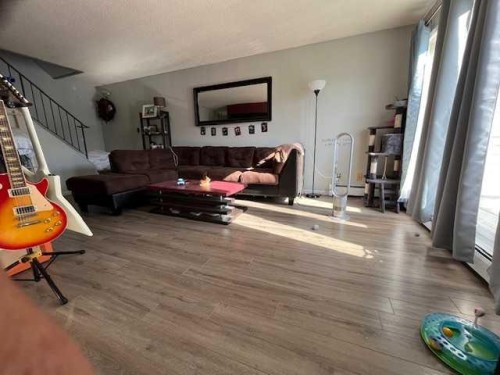13-11219 103A Avenue Nw, Edmonton, AB - Indoor Photo Showing Living Room