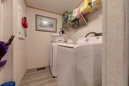 1006 9 Ave, Smith, AB - Indoor Photo Showing Laundry Room