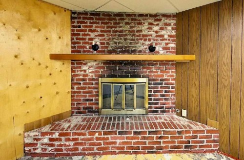 4324 7 Avenue, Edson, AB - Indoor Photo Showing Other Room With Fireplace