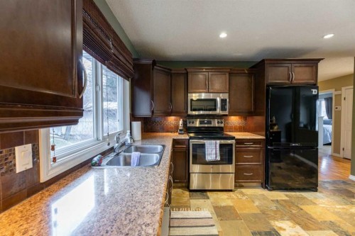 124 Cheviot Drive, Hinton, AB - Indoor Photo Showing Kitchen With Double Sink