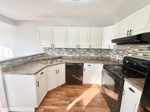 106 Reimer Drive, Hinton, AB - Indoor Photo Showing Kitchen With Double Sink