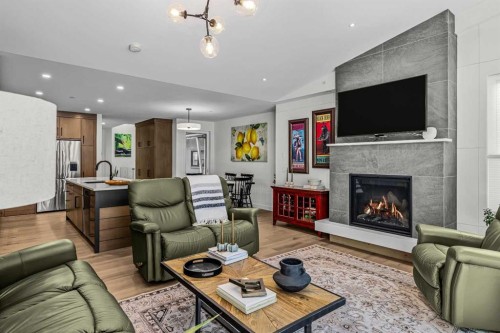 283C Three Sisters Drive, Canmore, AB - Indoor Photo Showing Living Room With Fireplace