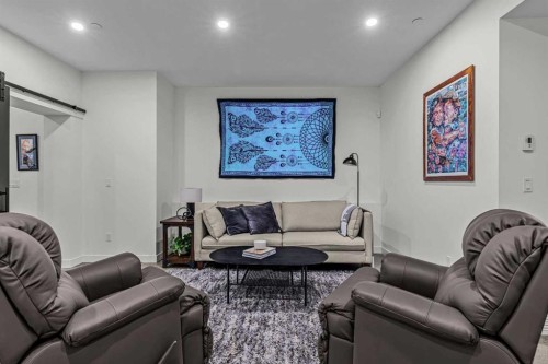 283C Three Sisters Drive, Canmore, AB - Indoor Photo Showing Living Room