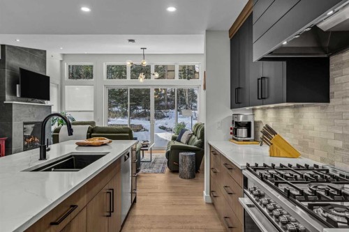283C Three Sisters Drive, Canmore, AB - Indoor Photo Showing Kitchen With Double Sink With Upgraded Kitchen