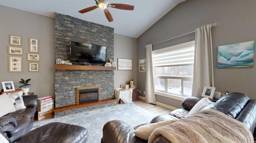 11 Abraham Drive, Whitecourt, AB - Indoor Photo Showing Living Room With Fireplace
